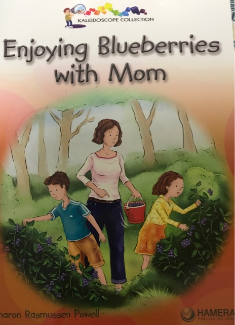 Enjoying blueberries with mom